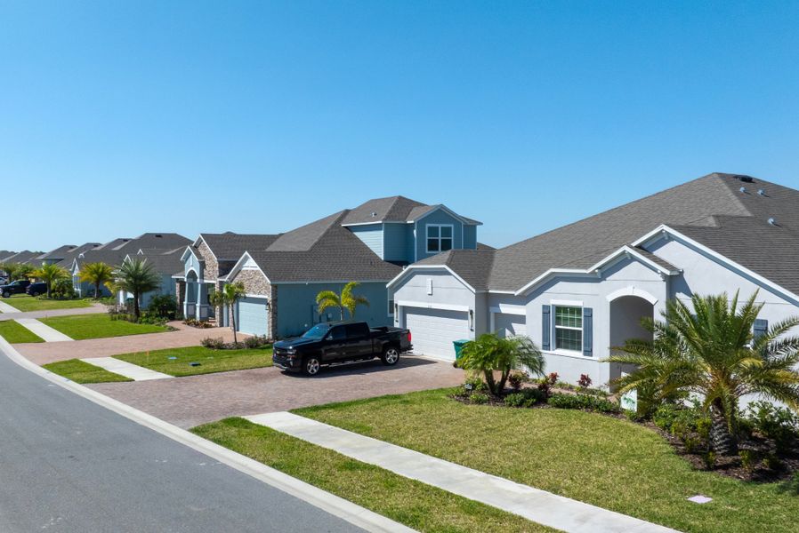 Front exterior of a home in the Island Forest Preserve community, located in Merritt Island, FL (Image 1).