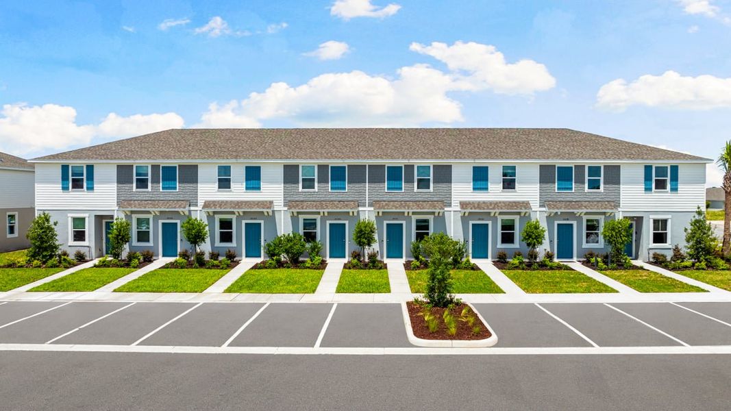 Front exterior of a home in the The Towns at Firethorn community, located in Parrish, FL (Image 4).
