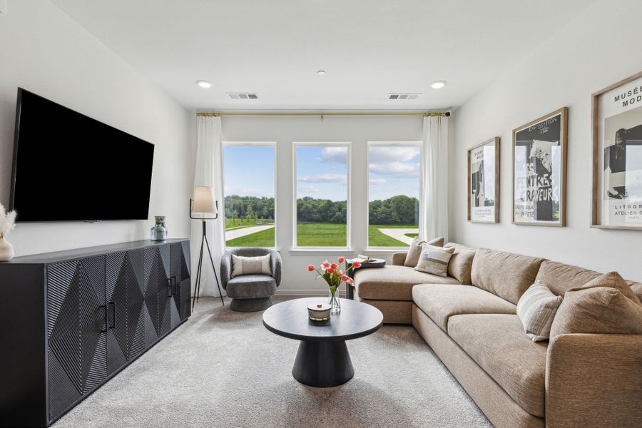 Furnished interior in a model home at Painted Tree - Woodland District in McKinney (Image 26).