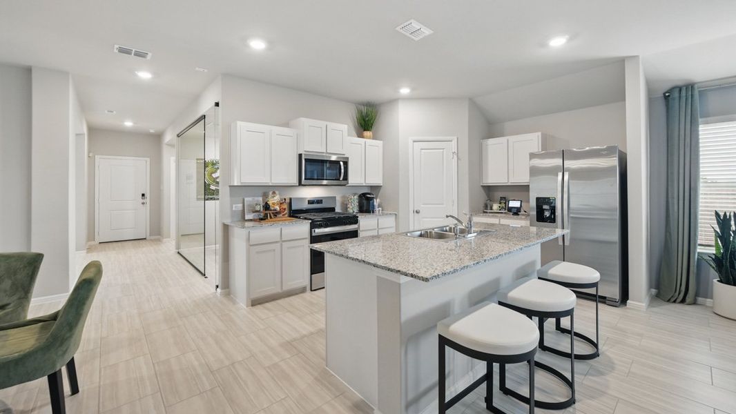 Furnished interior in a model home at Hickory Grove in Krum (Image 5).