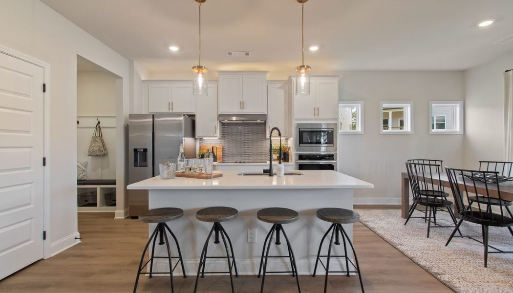 Furnished interior in a model home at Kentmere in Auburn (Image 31).