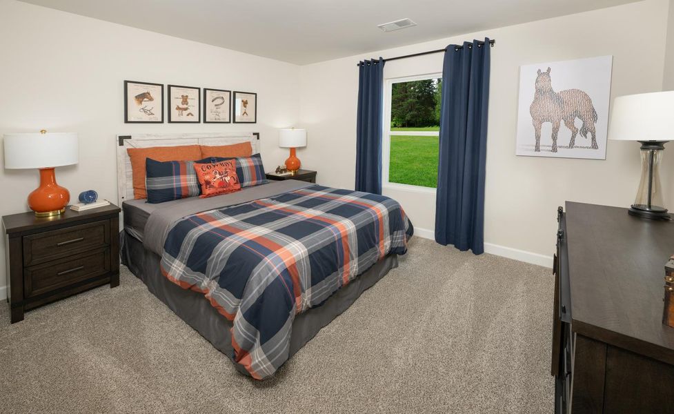 Furnished interior in a model home at Chatham Forest in Duncan (Image 10).