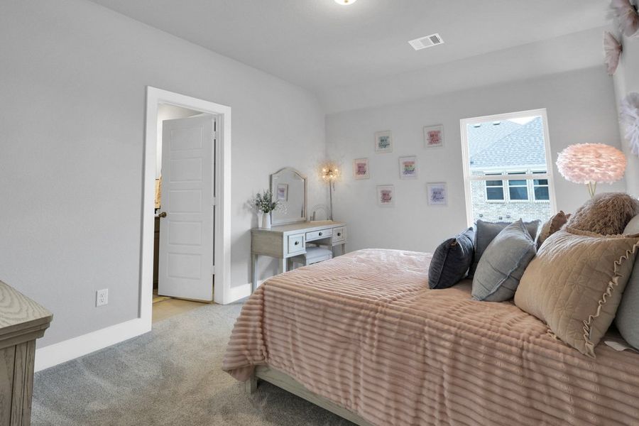 Furnished interior in a model home at Polo Ridge in Forney (Image 9).