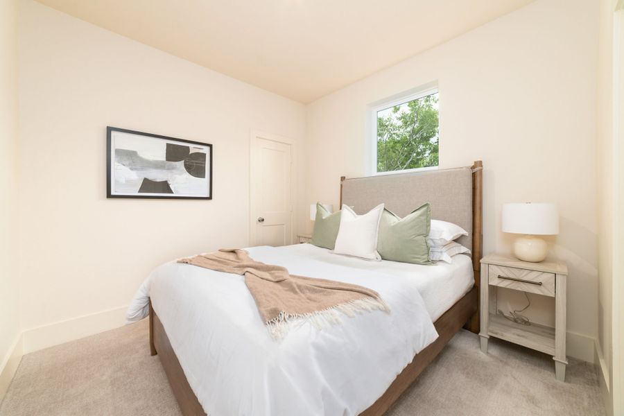 Furnished interior in a model home at Rachel Reserve in Houston (Image 9).