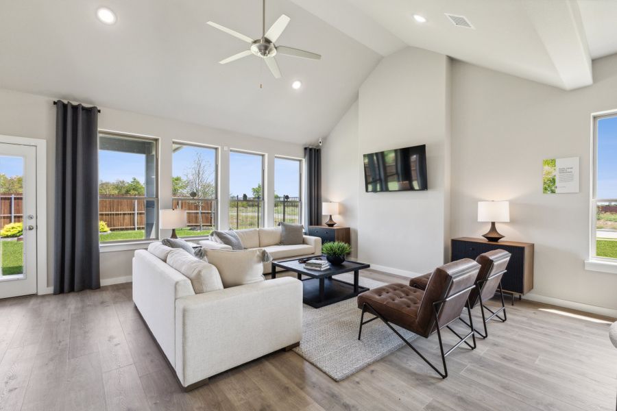 REPRESENTATIVE PHOTO – Living Room in a Stratton Place new home in Greenville TX by Trophy Signature Homes