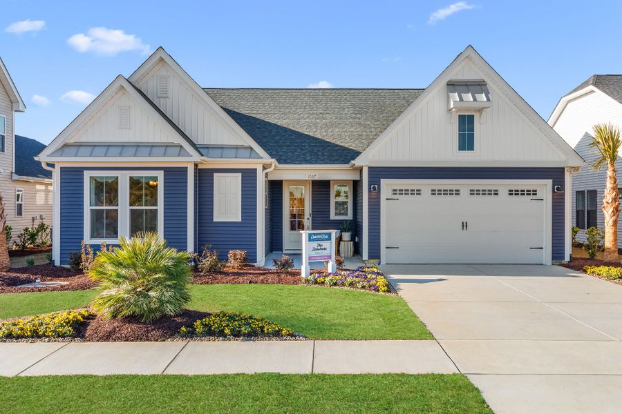 Front exterior of a home in the Coastal Club of the Carolinas community, located in Calabash, NC (Image 3). Front exterior of a home in the Coastal Club of the Carolinas community, located in Calabash, NC (Image 3).