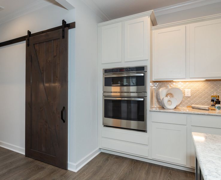Furnished interior in a model home at The Gables in Moyock (Image 20).