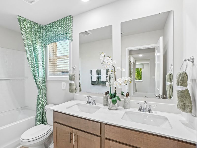 Furnished interior in a model home at Cadence Meadows in Zebulon (Image 25).