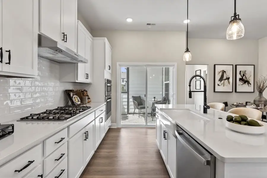 Furnished interior in a model home at Austin Village in Locust (Image 3).