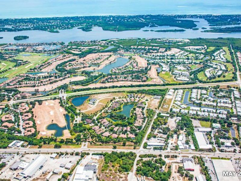 Aerial view of the The Falls at Grand Harbor community in Vero Beach, FL, showing layout and nearby surroundings (Image 25).