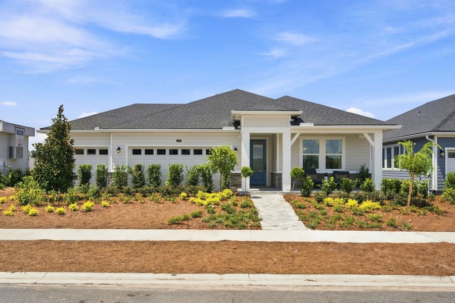 Front exterior of a home in the The Preserve at Laurelton – Canopy Collection community, located in Green Cove Springs, FL (Image 24).