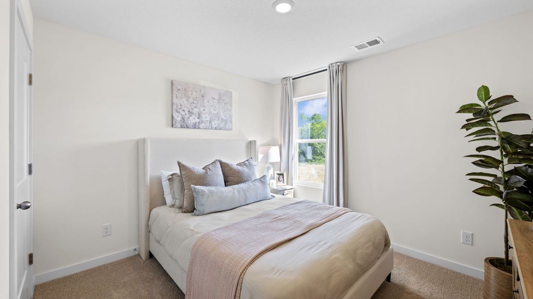 Furnished interior in a model home at Timber Creek in Rossville (Image 4).
