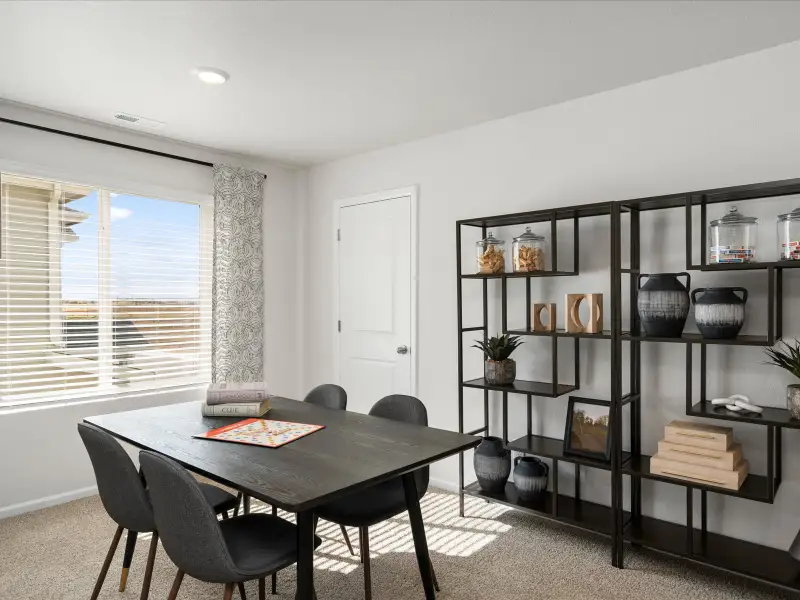 Furnished interior in a model home at Lorson Ranch: The Trail Collection in Colorado Springs (Image 9).