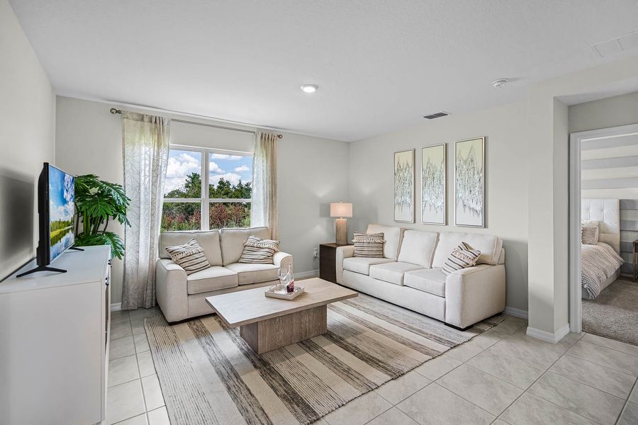 Furnished interior in a model home at Lakes at Laurel Highlands in Lakeland (Image 22).