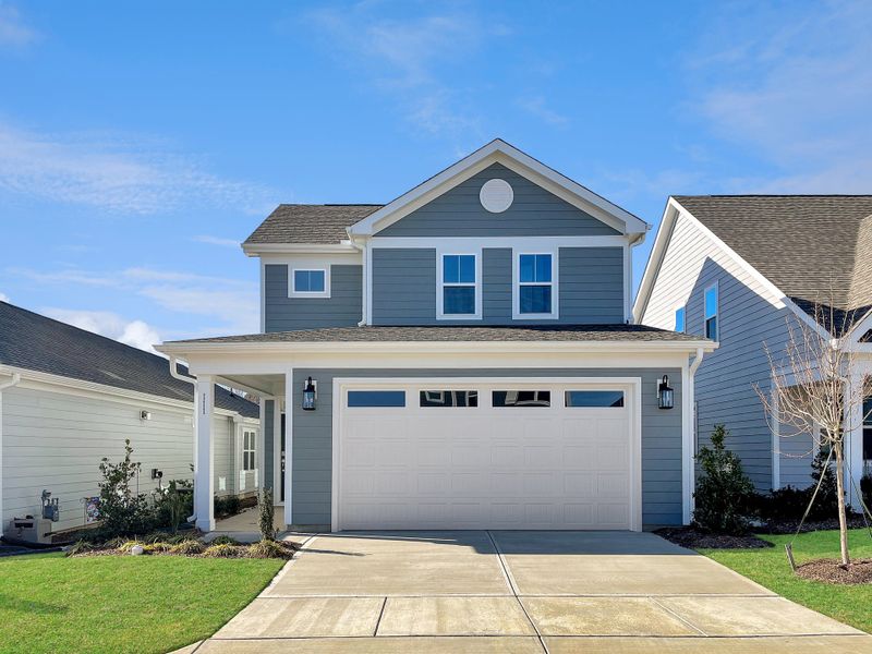 Front exterior of a home in the The Walk at East Village community, located in Clayton, NC (Image 24). Front exterior of a home in the The Walk at East Village community, located in Clayton, NC (Image 24).