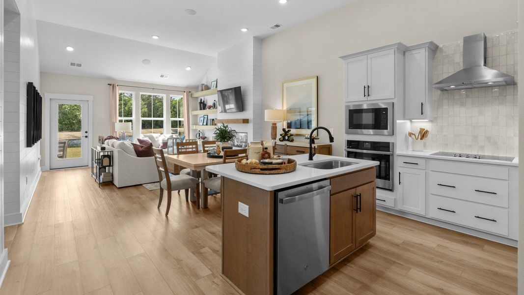 The Summit features open-concept living with a spacious kitchen and gathering area.