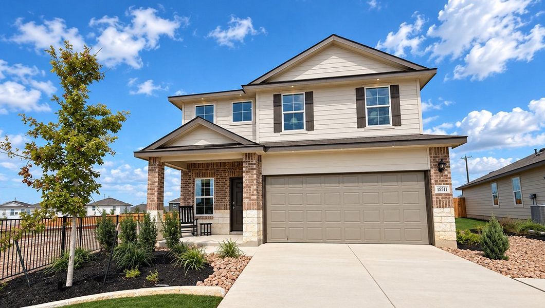 Front exterior of a home in the Redbird Ranch community, located in San Antonio, TX (Image 25).