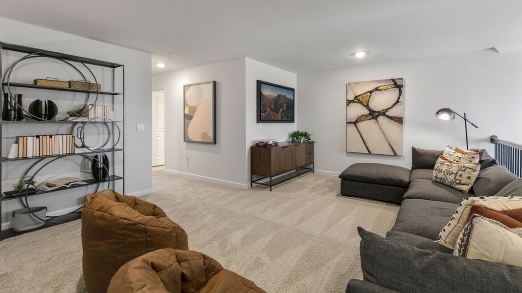 Furnished interior in a model home at The Meadows at Kinsley in Jamestown (Image 14).