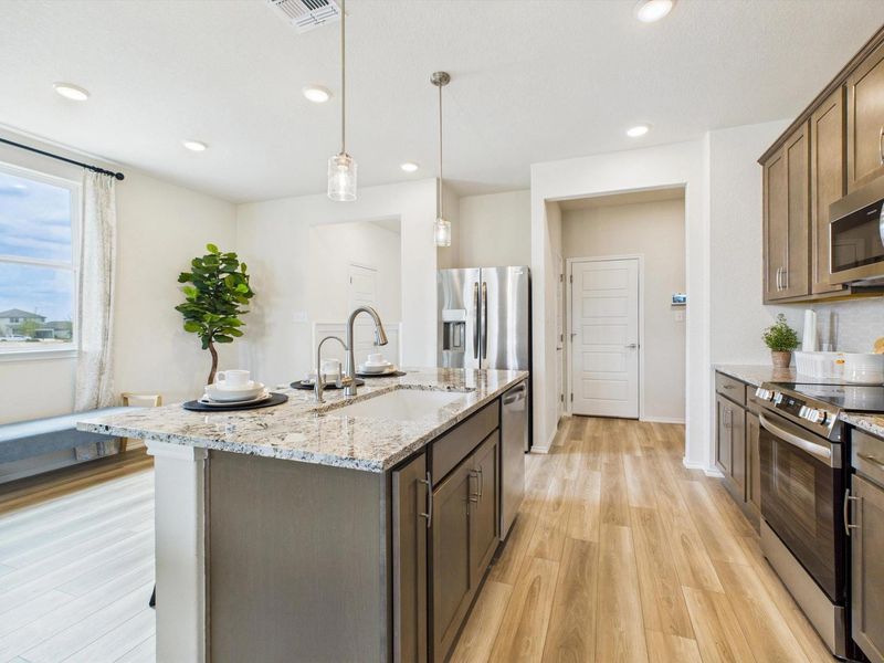 Furnished interior in a model home at Fairway Crossing in Converse (Image 5).