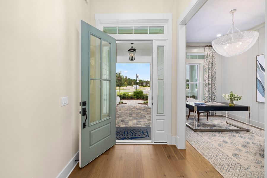 Furnished interior in a model home at Hidden Creek at SilverLeaf 80' Gold Series in St. Augustine (Image 7).