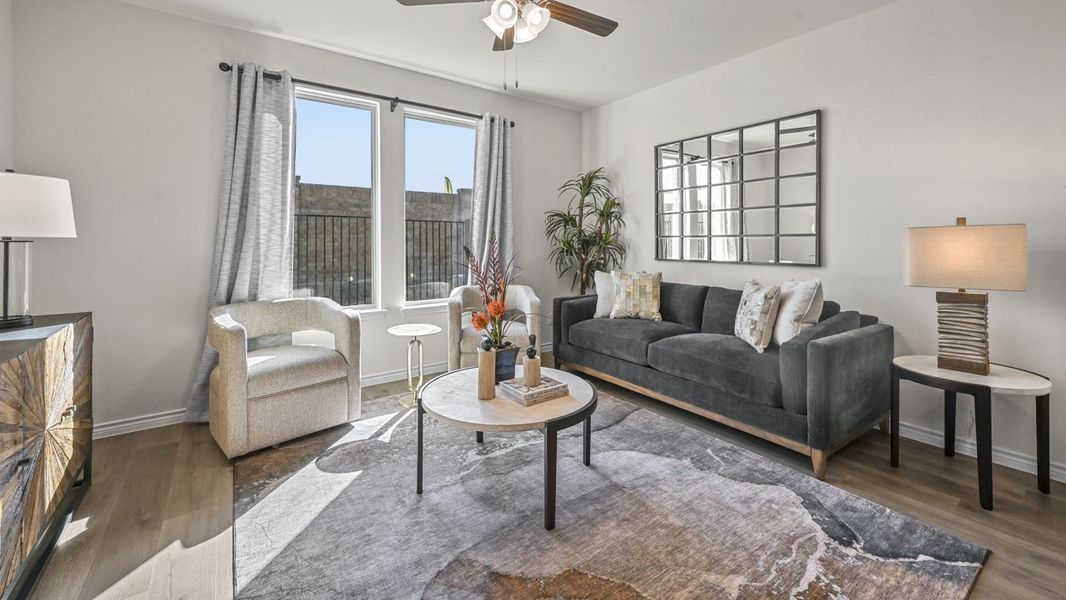 Furnished interior in a model home at The Villages of Hurricane Creek Townhomes in Anna (Image 13). Furnished interior in a model home at The Villages of Hurricane Creek Townhomes in Anna (Image 13).