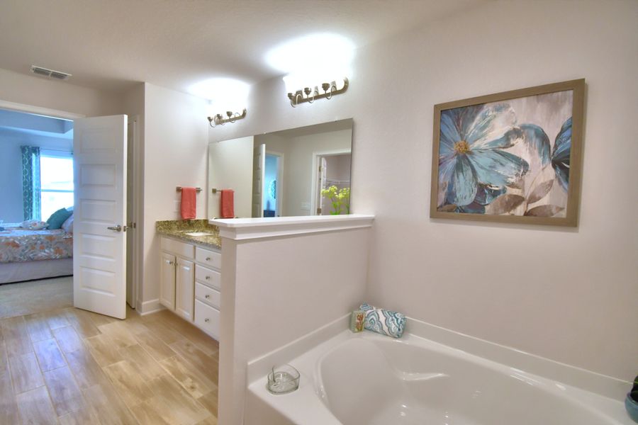 Furnished interior in a model home at Citrus Landing in Davenport (Image 34).