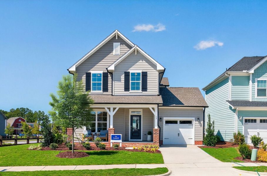 Front exterior of a home in the Serenity - The Cottage Collection community, located in Fuquay Varina, NC (Image 4).