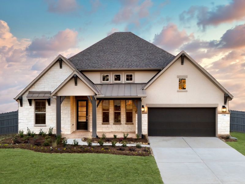 Front exterior of a home in the Valencia: Hilltop Collection community, located in Manvel, TX (Image 4).