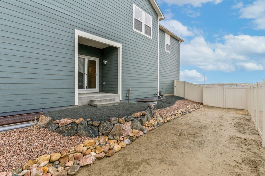 Front exterior of a home in the The Trails at Aspen Ridge – Altitude Collection community, located in Colorado Springs, CO (Image 5).