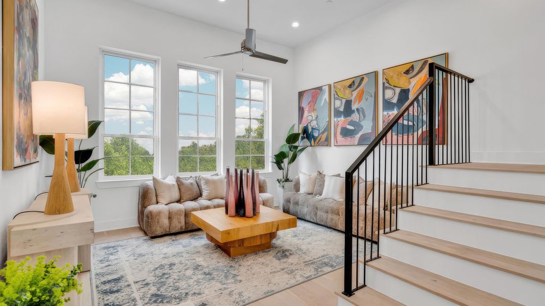 Furnished interior in a model home at Upper East River in Houston (Image 12).