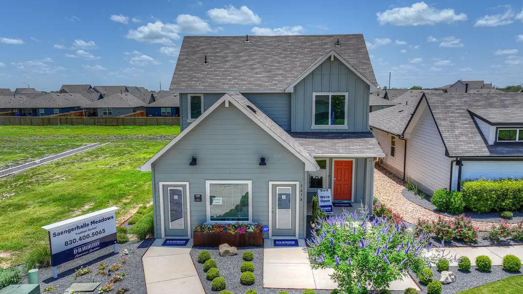 Front exterior of a home in the Saengerhalle Meadows community, located in New Braunfels, TX (Image 1).