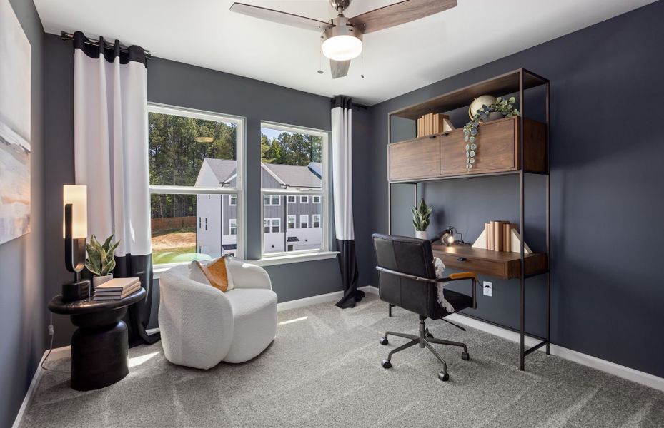 Furnished interior in a model home at Lakeside Townes at Riverlights in Wilmington (Image 6).