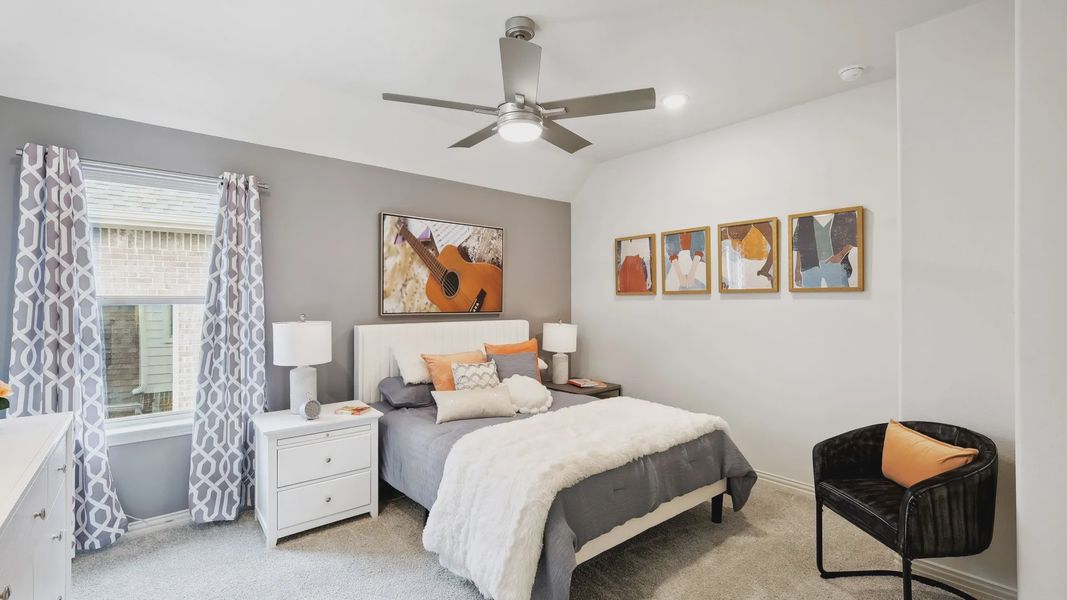 Discover luxurious comfort in a chic bedroom featuring plush fabrics and stunning artwork at The Oaks.