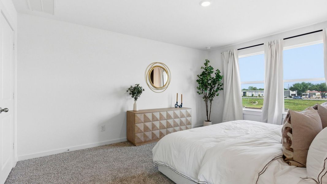 Furnished interior in a model home at Murphy Village in Missouri City (Image 18).