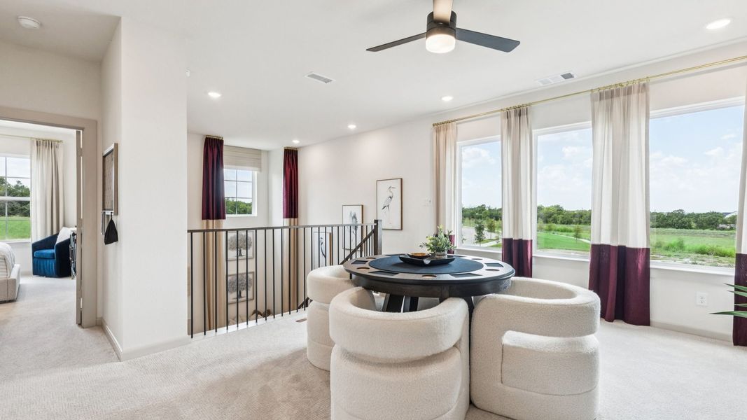 Furnished interior in a model home at The Heights at Uptown in Celina (Image 8).