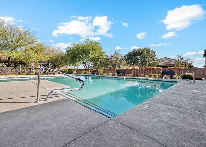 photo of sparkling community pool at north copper canyon in surprise, az new homes for sale by century communities. photo of sparkling community pool at north copper canyon in surprise, az new homes for sale by century communities.