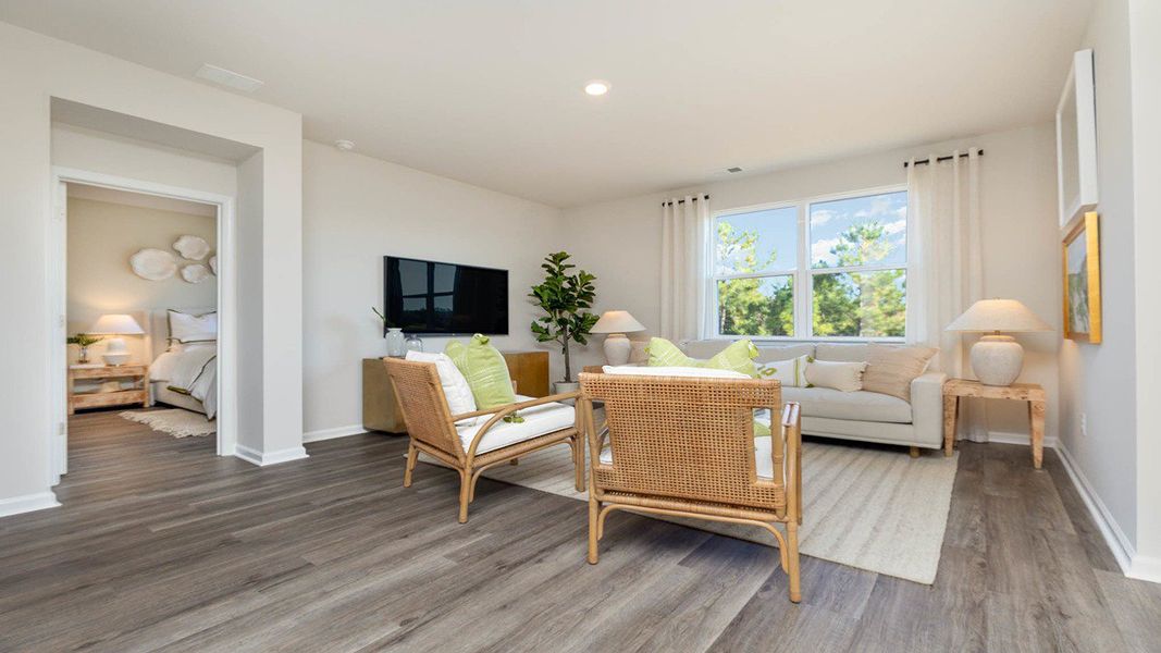 Furnished interior in a model home at Eden Springs in Longs (Image 17).