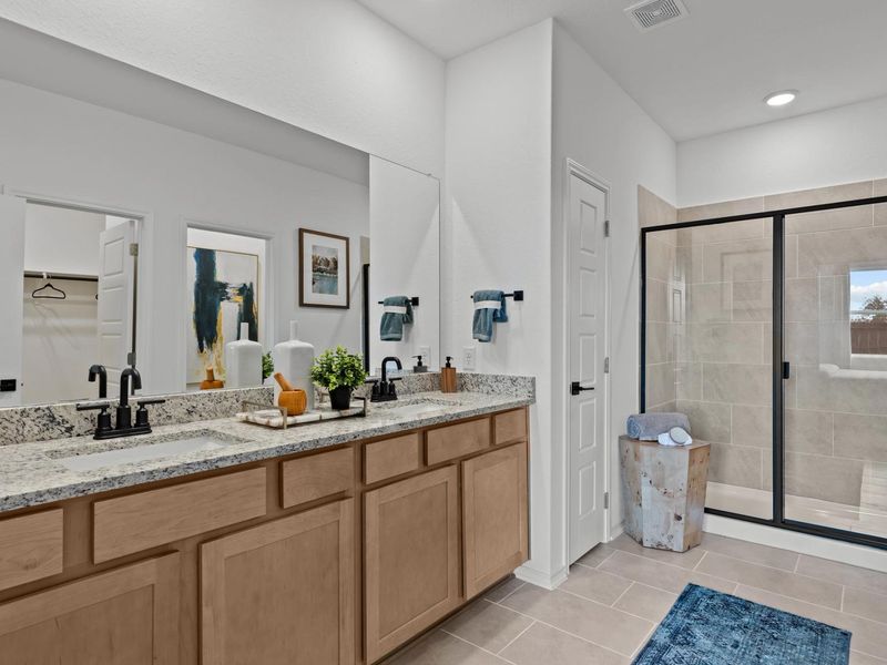 Furnished interior in a model home at Hickory Ridge in Elmendorf (Image 12).