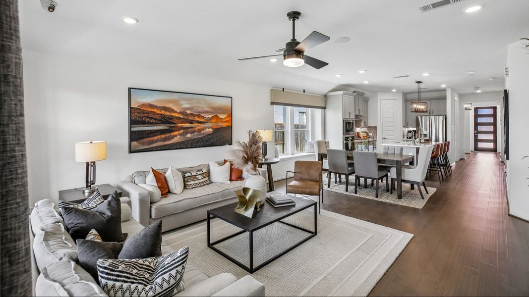 Elegant open-plan living space with chic finishes and contemporary design in Cypress Green. Elegant open-plan living space with chic finishes and contemporary design in Cypress Green.