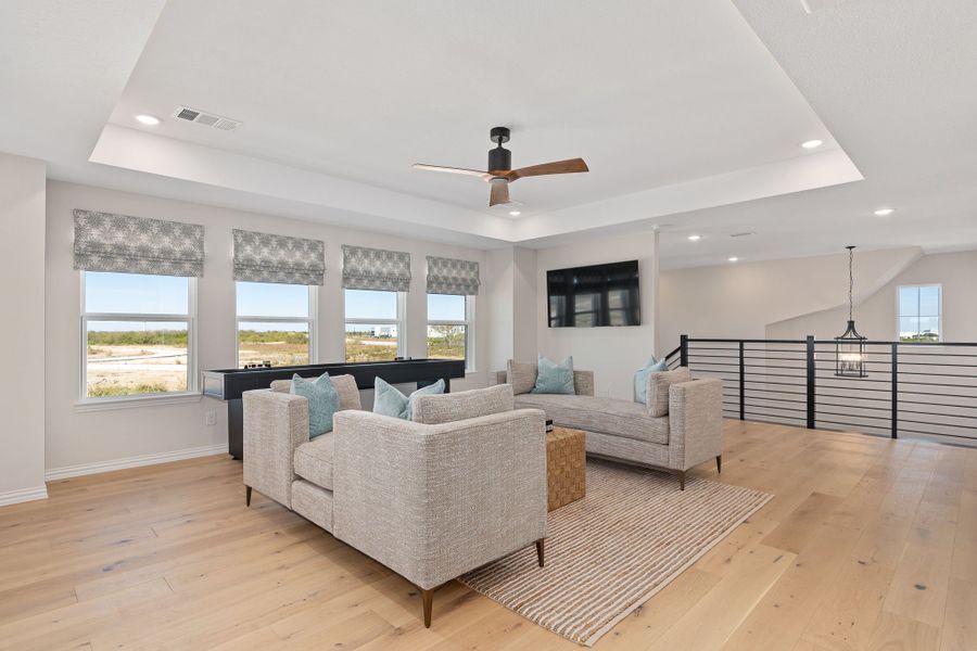 Furnished interior in a model home at Sweetgrass 50s in Haslet (Image 27).