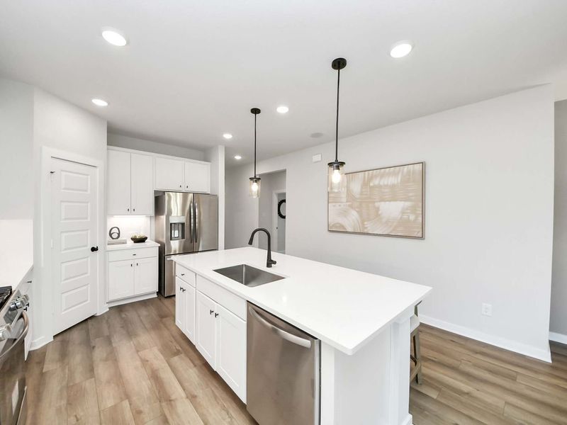 Furnished interior in a model home at Enclave at Newport in Crosby (Image 27).