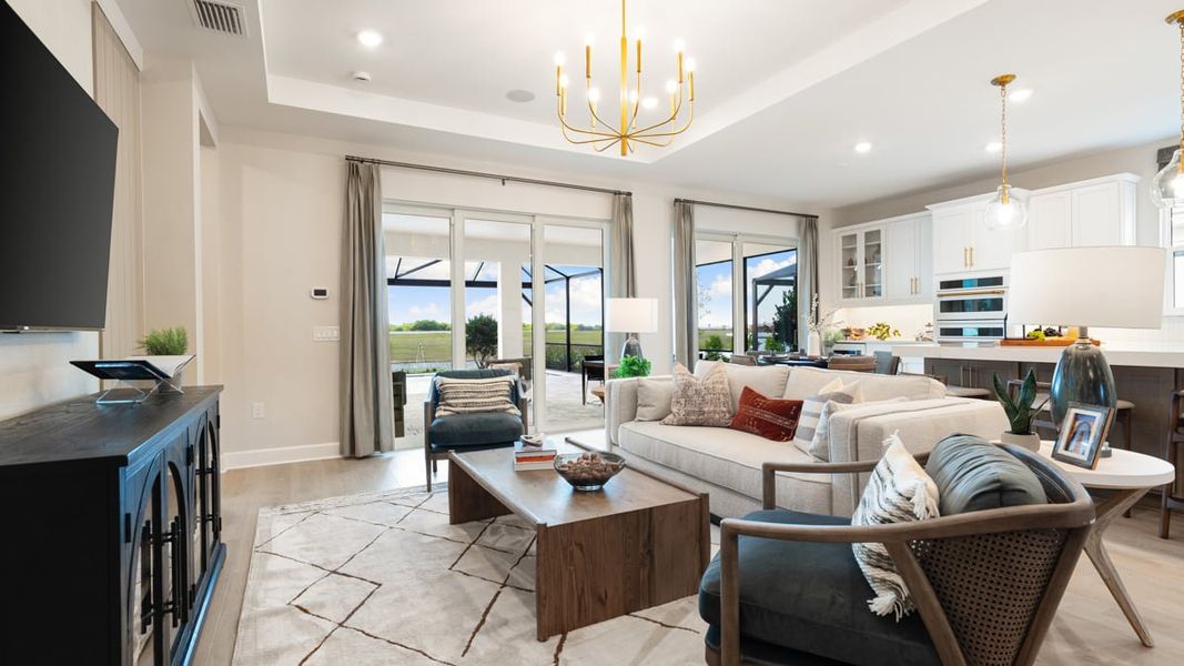 Furnished interior in a model home at Esplanade at Kingston in Estero (Image 10).