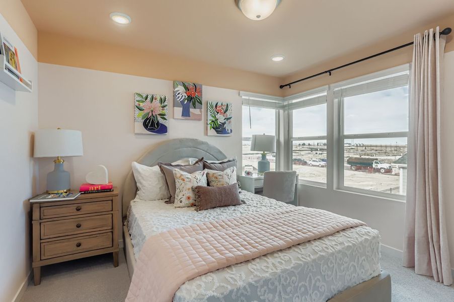 Furnished interior in a model home at Barefoot in Firestone (Image 11).