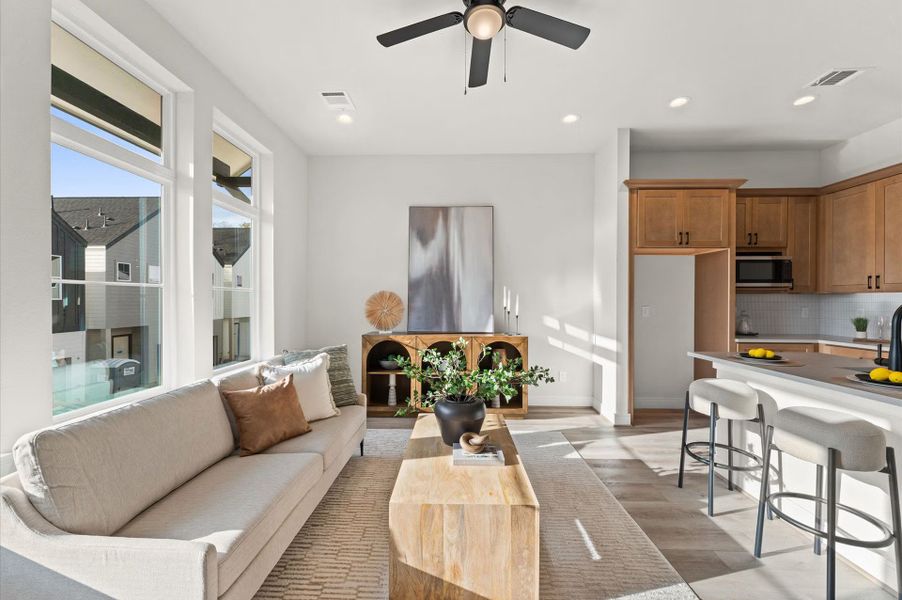 Furnished interior in a model home at Highland Gardens in Houston (Image 7).