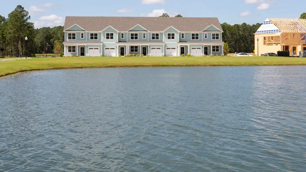 Front exterior of a home in the Indigo Preserve Townhomes community, located in Leland, NC (Image 2).