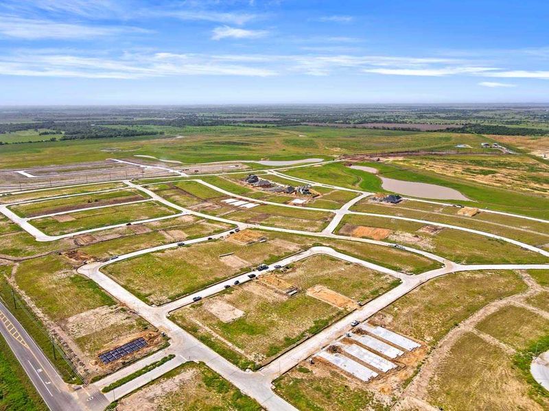 Aerial view of the Brookewater community in Rosenberg, TX, showing layout and nearby surroundings (Image 12).