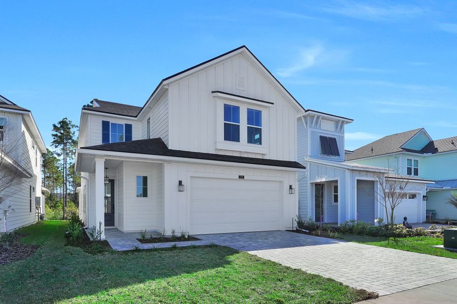 Front exterior of a home in the Mariposa at EverRange community, located in Jacksonville, FL (Image 8).