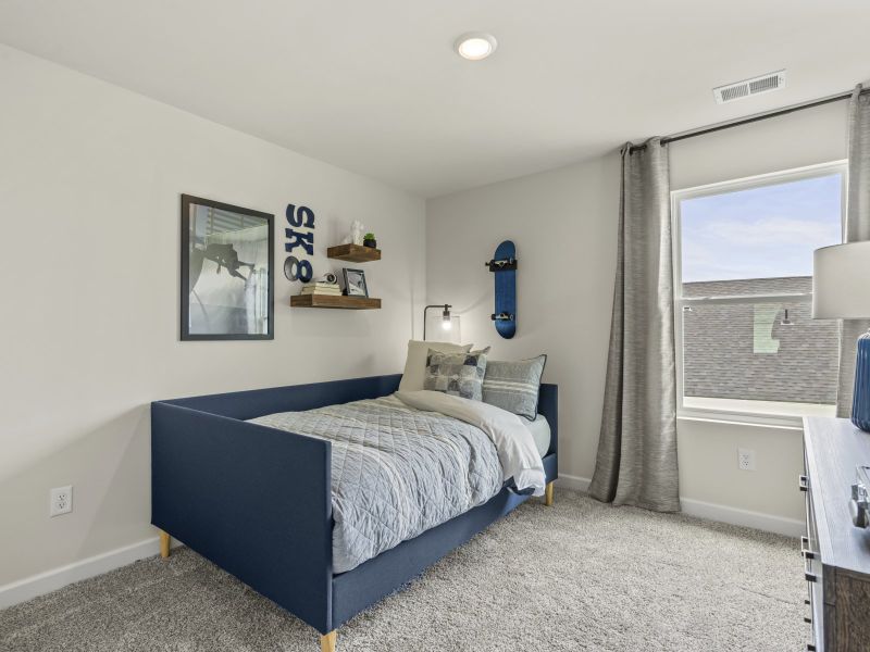 The fourth bedroom can serve double-duty as a guest suite and hobby room.