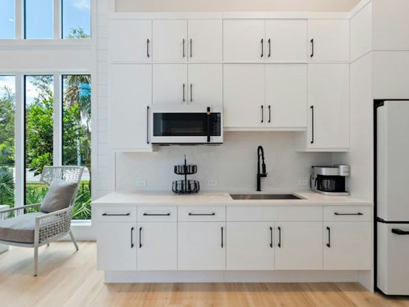 Furnished interior in a model home at Seaglass in Vero Beach (Image 12).