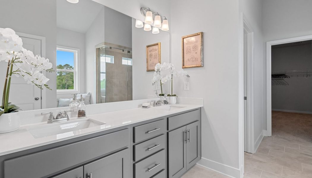 Furnished interior in a model home at Summerlin in Winder (Image 50).